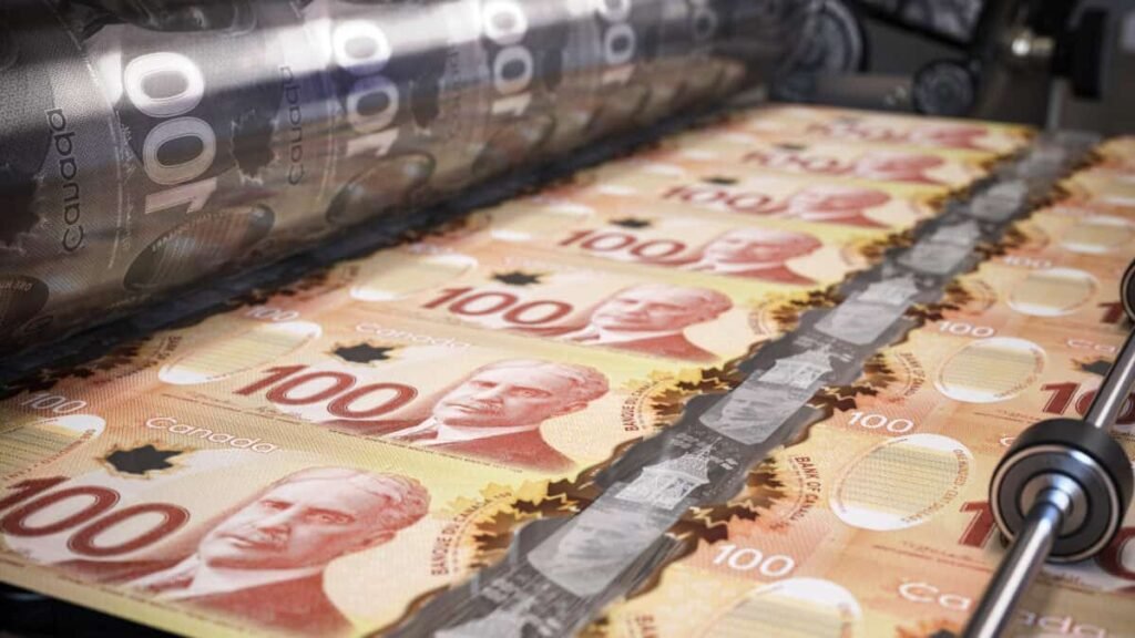 Got $14,000? Turn Your TFSA Into a Cash-Gushing Machine Printing canadian dollar bills on a print machine